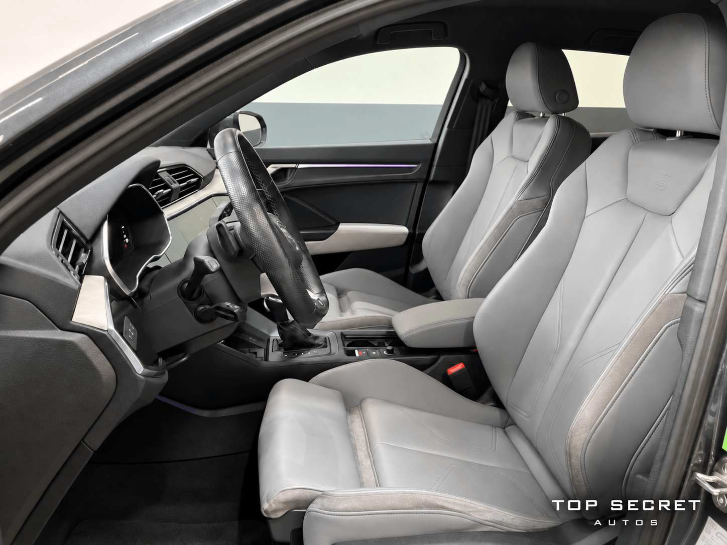Audi Q3 Sportback 45 TFSI e S line 2022, asientos deportivos delanteros