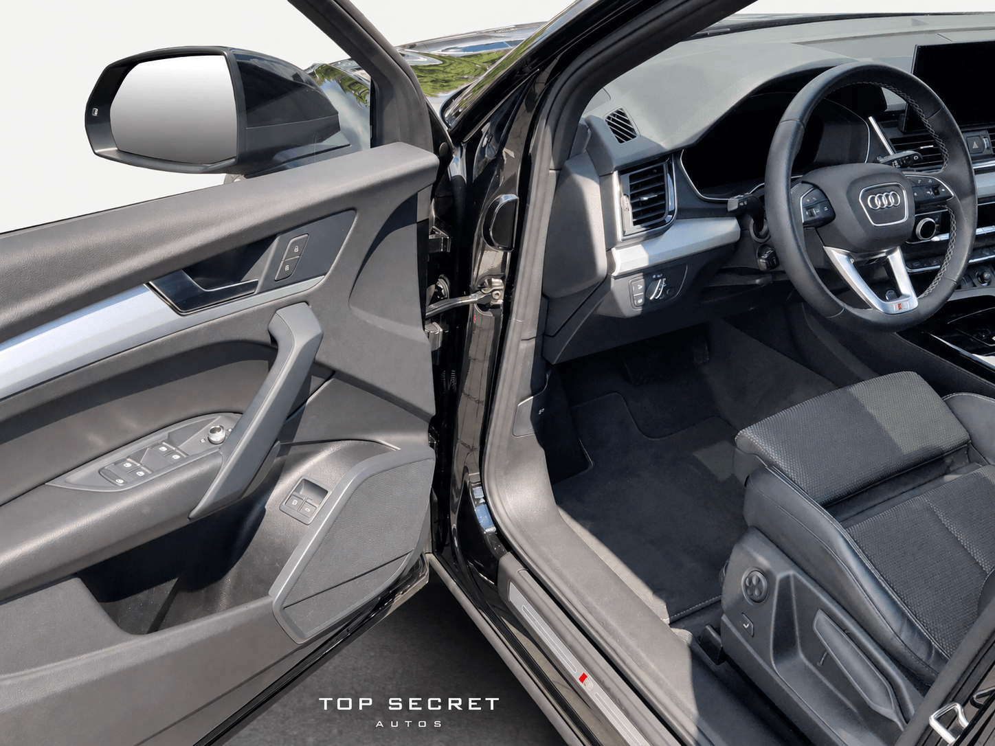 Audi Q5 55 TFSI e quattro S line 2023, asientos delanteros deportivos