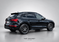 Audi Q5 55 TFSI e quattro S line 2023, trasera tres cuartos